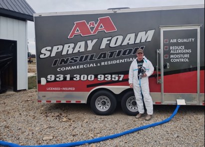 Terry 'Hoss' Tenison beside his A&A Spray Foam Insulation trailer in Lawrenceburg, Tennessee